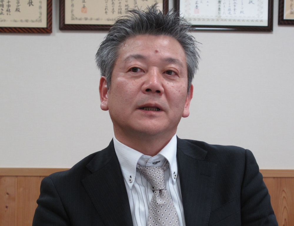 経理財務部の鈴木正志部長
