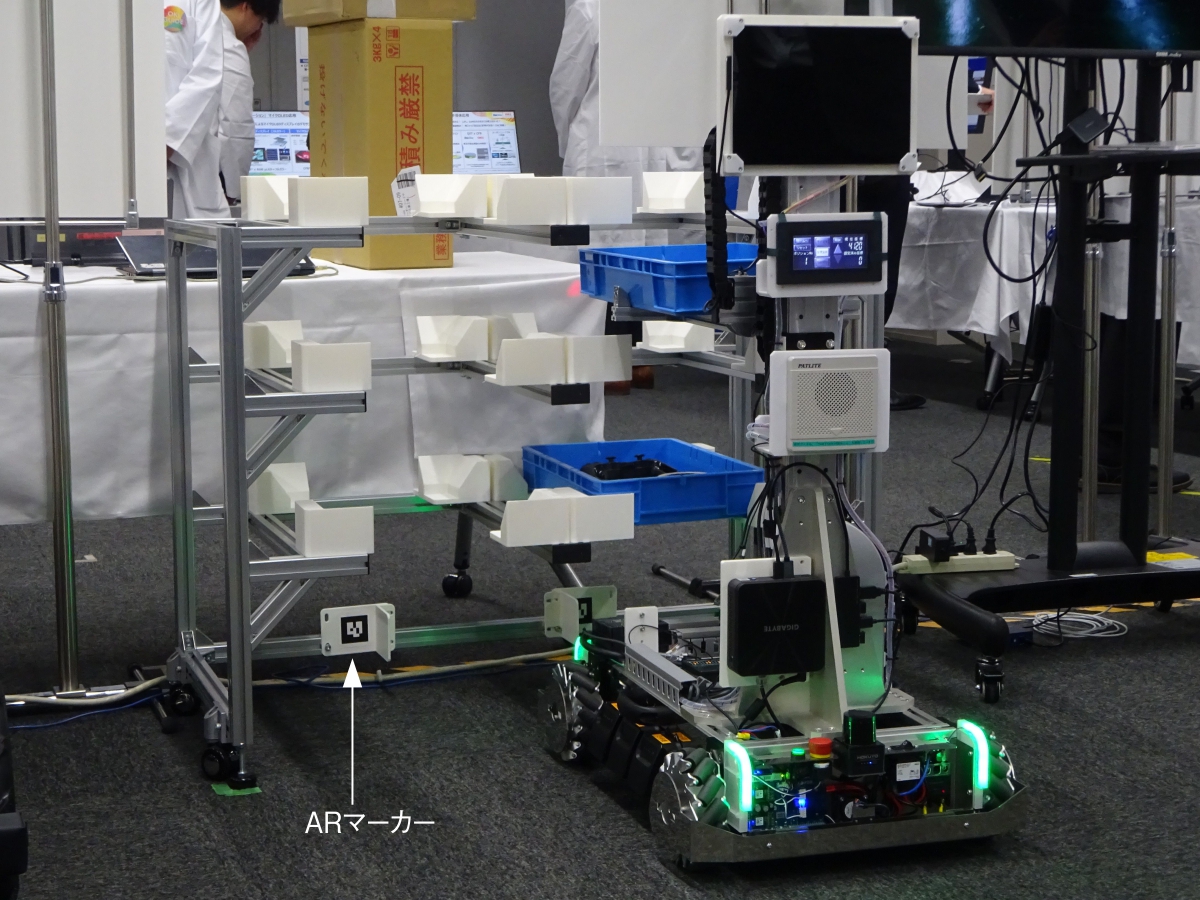 複数種の搬送ロボットを混在制御、OKIが「世の中になくて自前で開発
