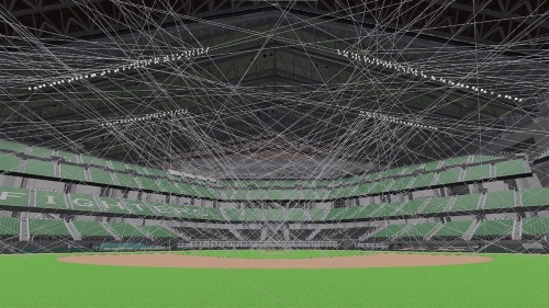 VRで見たホームベース側の照明配置。白い線は光の照射イメージ(資料:パナソニック)