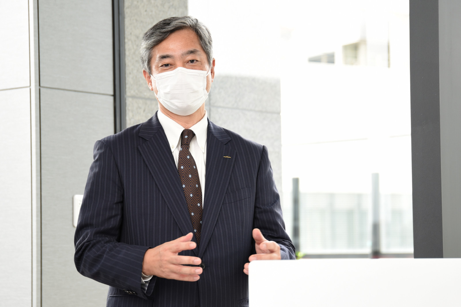 図4　みなとみらいイノベーションセンターの事業所長を務める村田製作所の川平博一氏