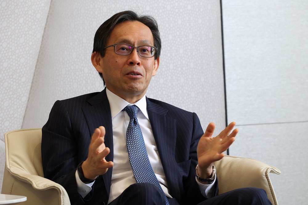 DX総合戦略を説明する三井物産の米谷佳夫副社長執行役員、CDIO