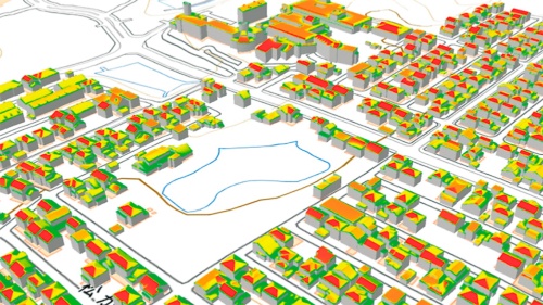 〔図1〕3D都市モデル（建築物の屋根面）を使った、太陽光発電量の推計シミュレーション。太陽光発電の普及に向けた施策検討の有用性を検証した例（資料：国土交通省、PLATEAU VIEW）