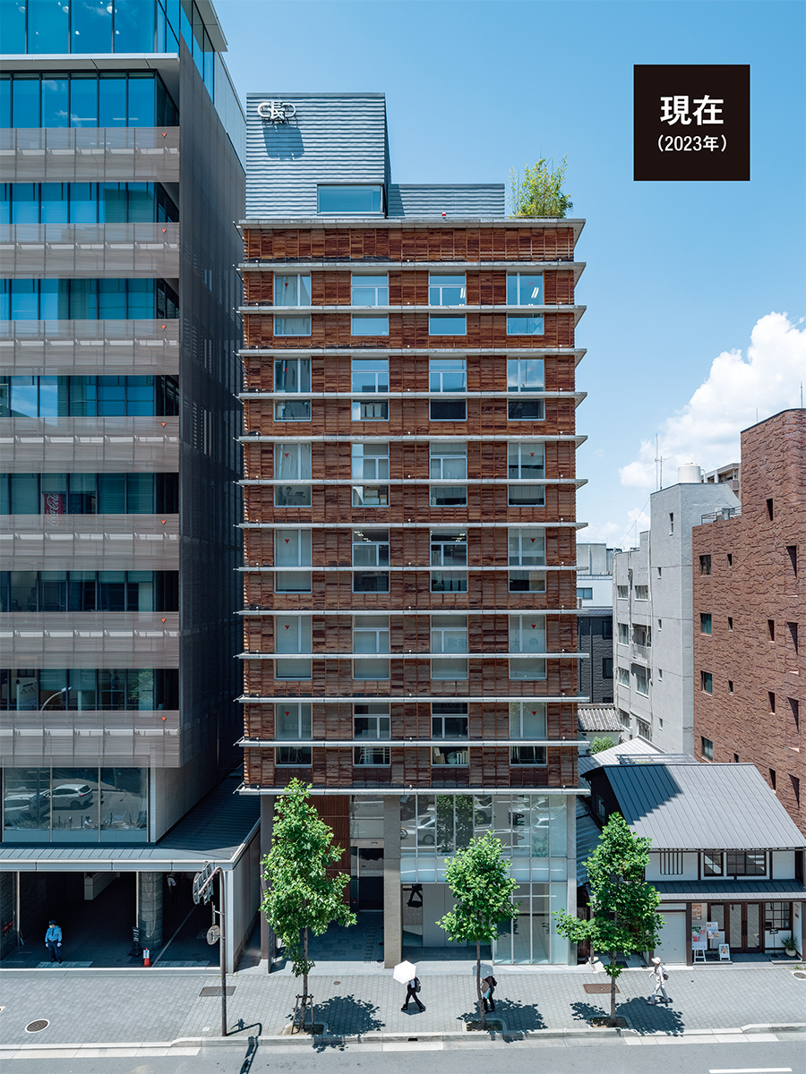 〔写真1〕下見板張りの9階建てオフィスビル