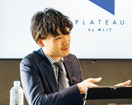 写真1■ 国土交通省が3D都市モデルを無償公開。「Project PLATEAU」を推進する国交省都市政策課の内山裕弥課長補佐(写真:国土交通省)