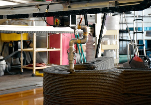 資料3■ ポリウスの3Dプリンターの一例。プロジェクトごとに性能をアップデートしている(写真:日経クロステック)