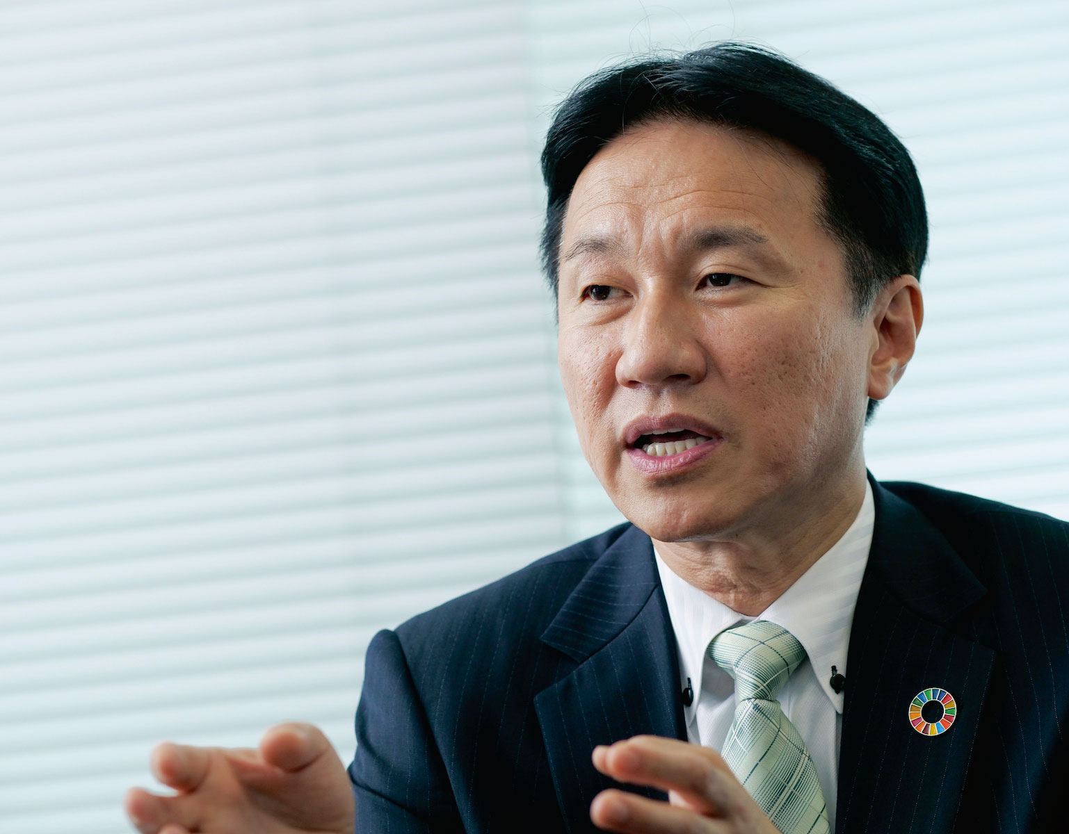 図1　「米国のような状況にならない設備共用の仕組みをつくっていく必要がある」と語るソフトバンクの佃氏